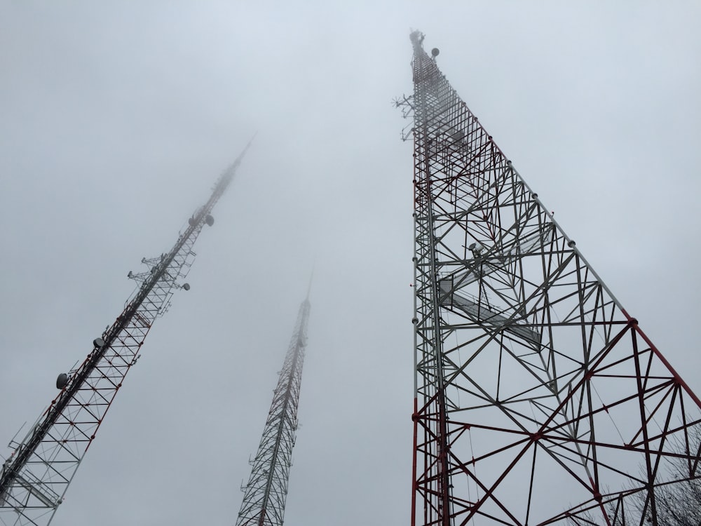 foggy skies over three steel towers
