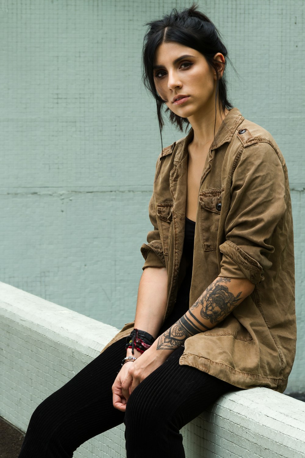 woman in brown button-up long-sleeved shirt