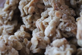 Clusters of granola with visible oats and a slightly crunchy texture.