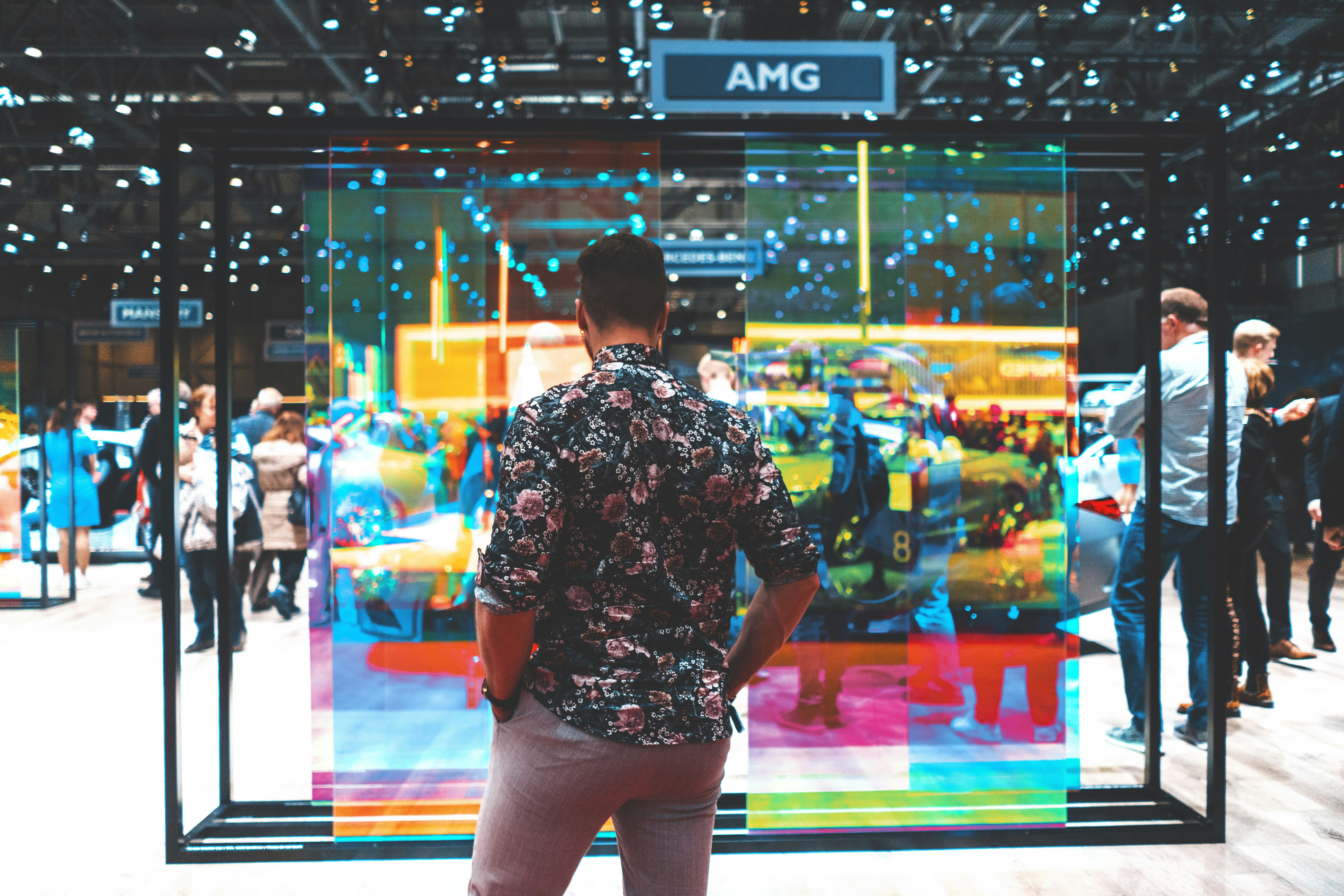man standing on AMG display