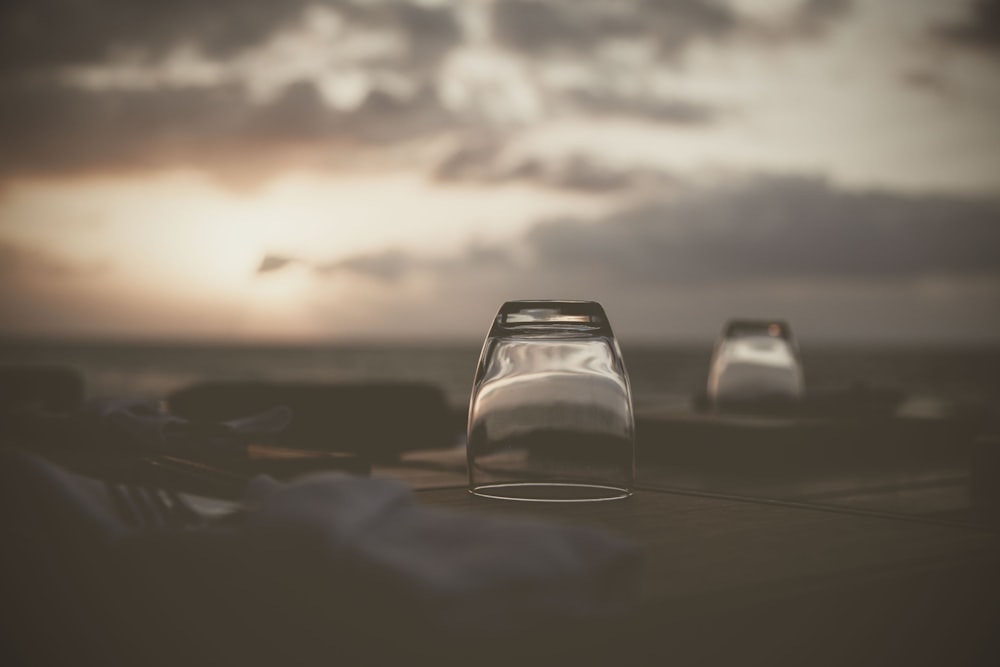 selective focus photography of clear drinking glass