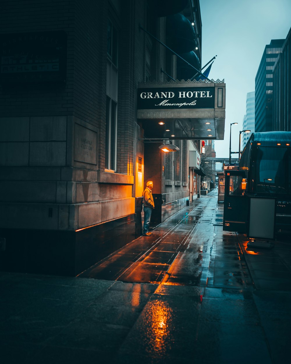 man standing outside building