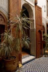 Welcoming entrance of a furnished apartment with tasteful Moroccan design elements.