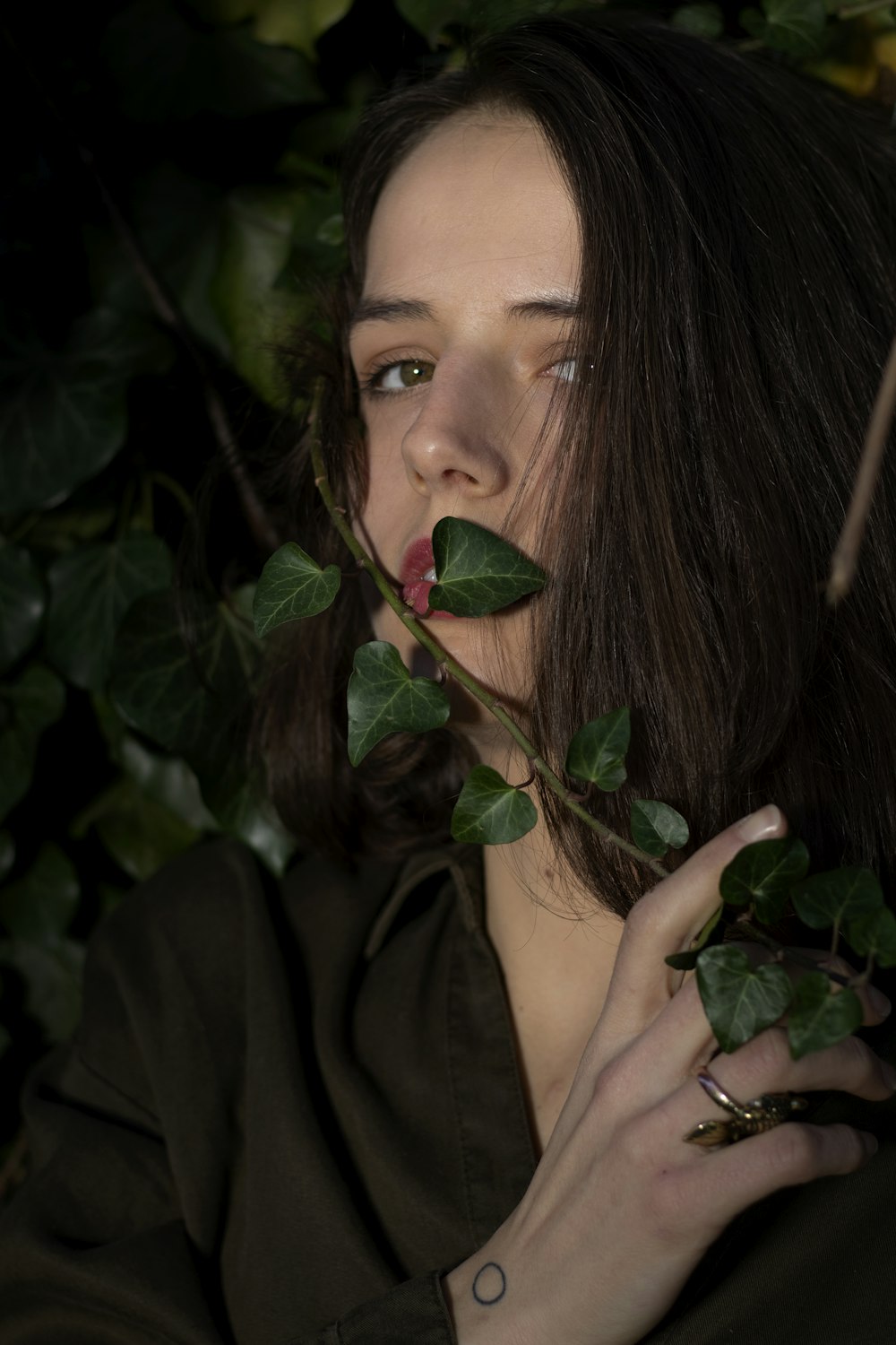 woman wearing brown top