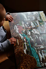 Illustration of a child reading a storybook with Masha and the Bear characters.
