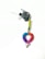 A keychain with a braided heart made of blue, purple, and pink threads is attached to a metal ring with two small silver bells. The braided portion is multicolored, transitioning through shades of blue, purple, and pink. It is connected to a loop of braided thread in yellow and green, from which keys are hanging.