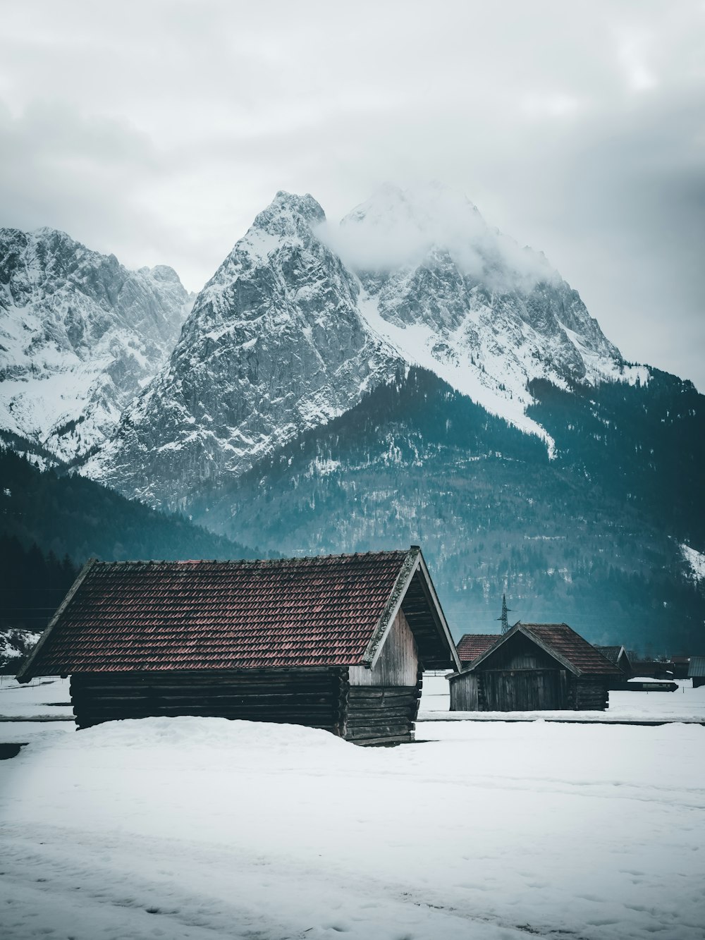 brown house near mountain during daytime