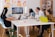 five person by table watching turned on white iMac