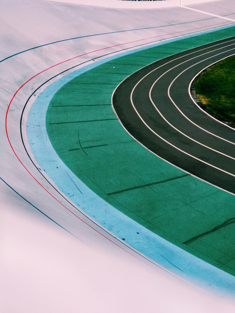 a person riding a skateboard on a track