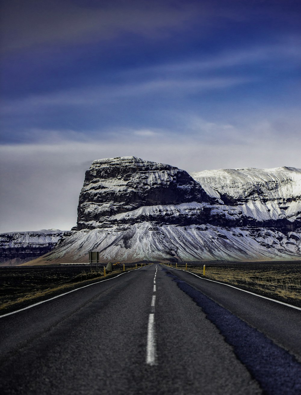 concrete road under blue sky