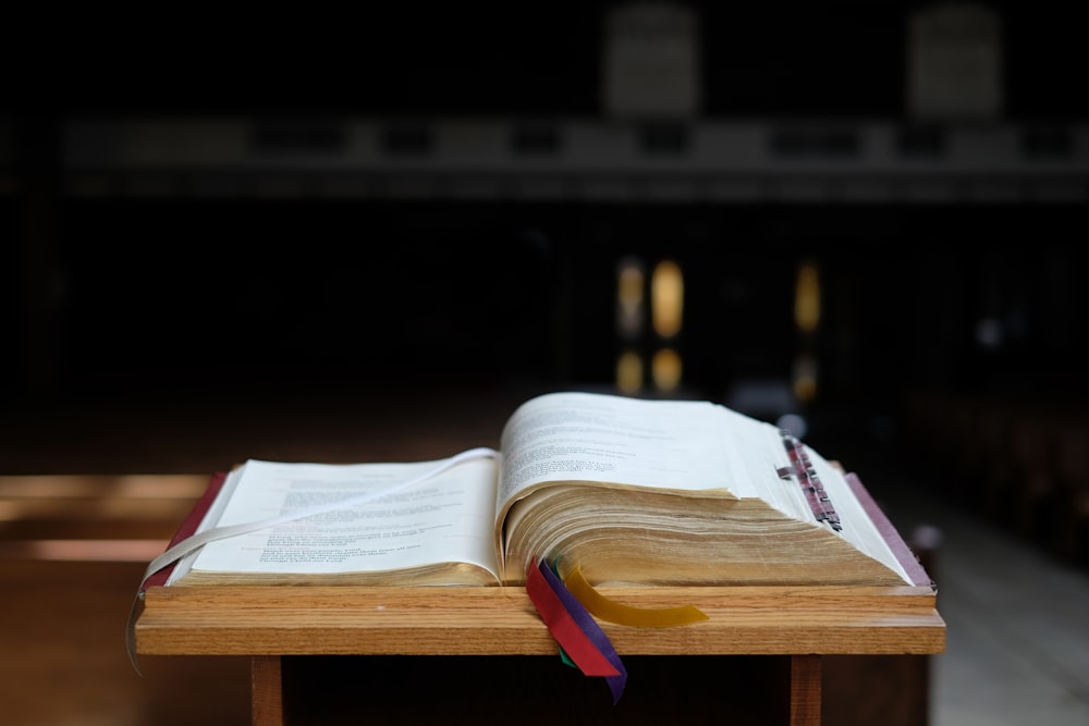 open book on wooden stand