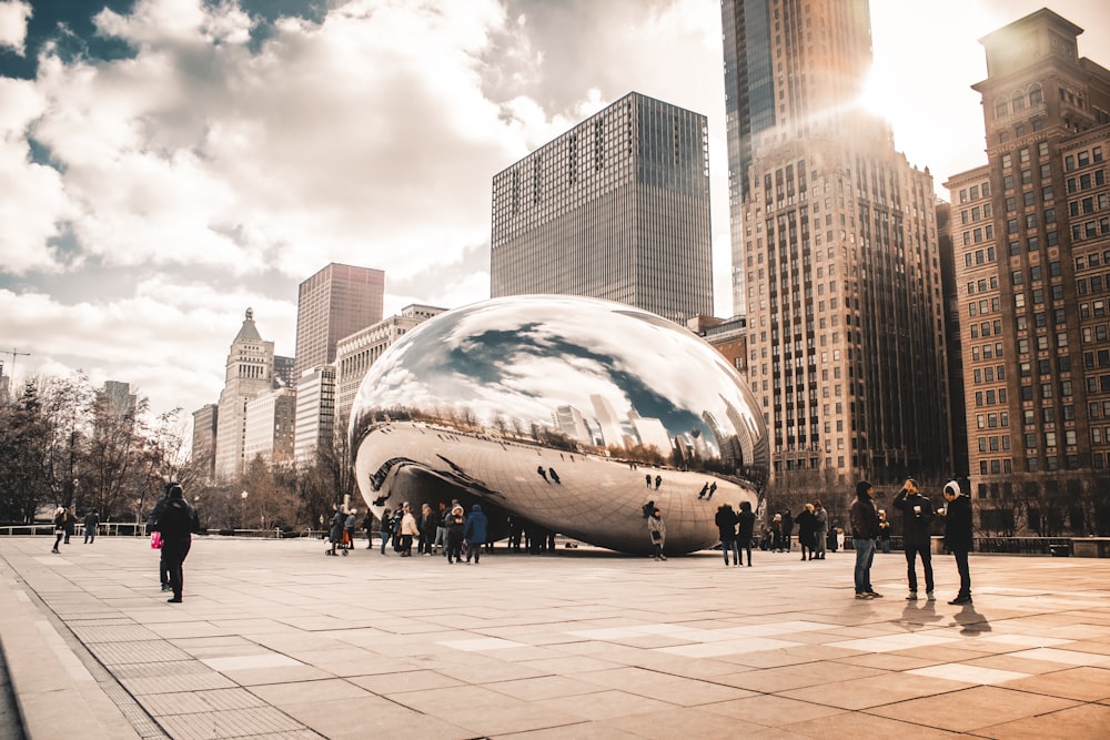 people walking near Cloud Gate in Chicago during daytime