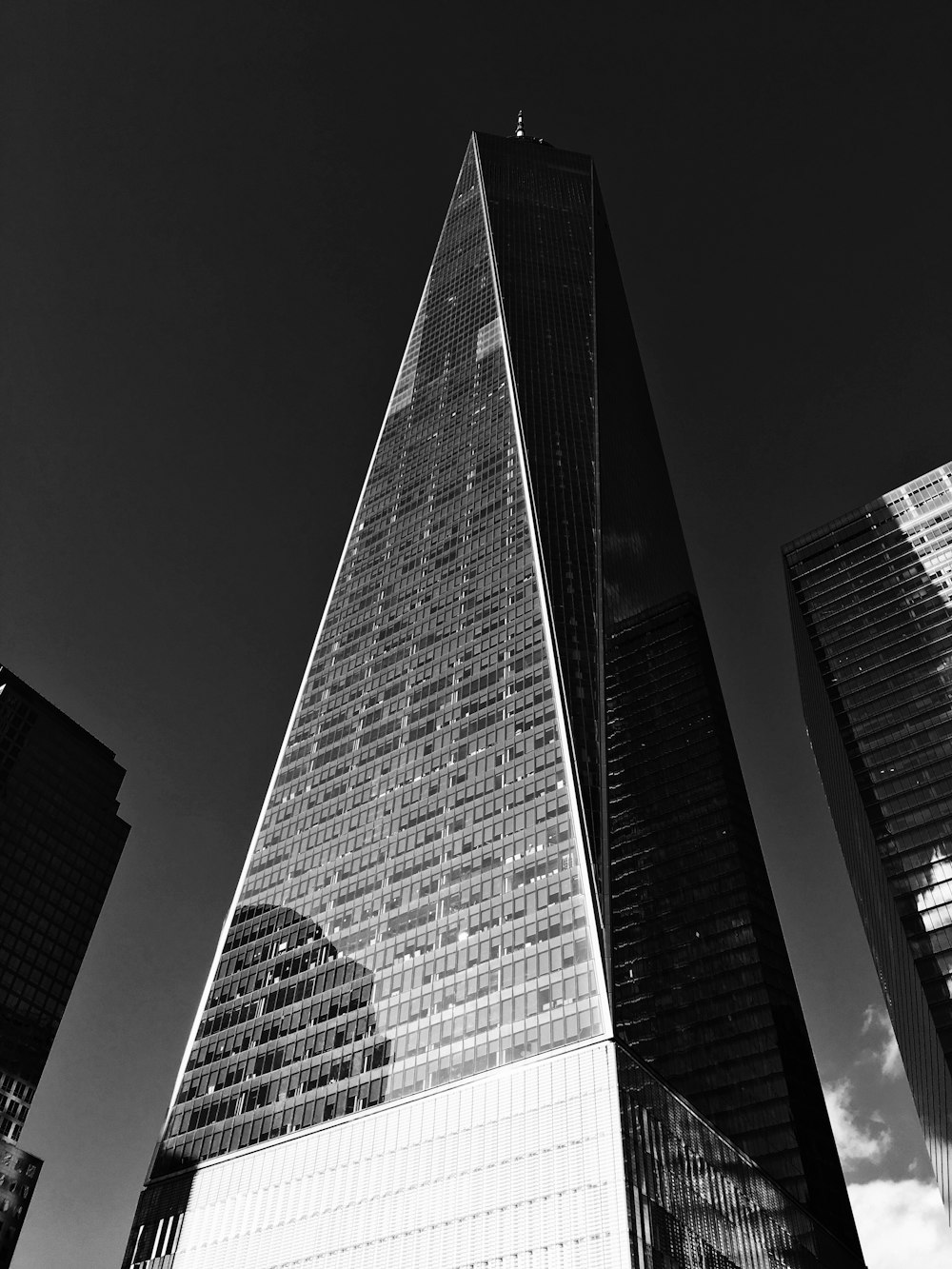 grayscale photography of high rise building