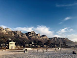 people walking on sand during daytime