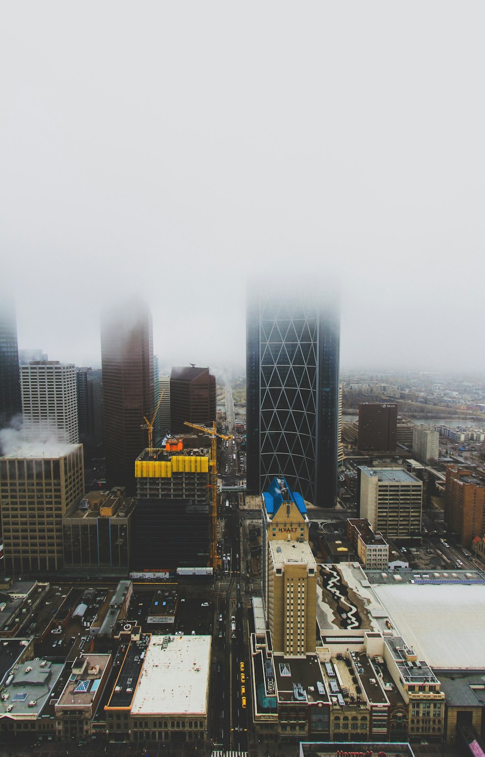 aerial photography of buildings under cloudy sky