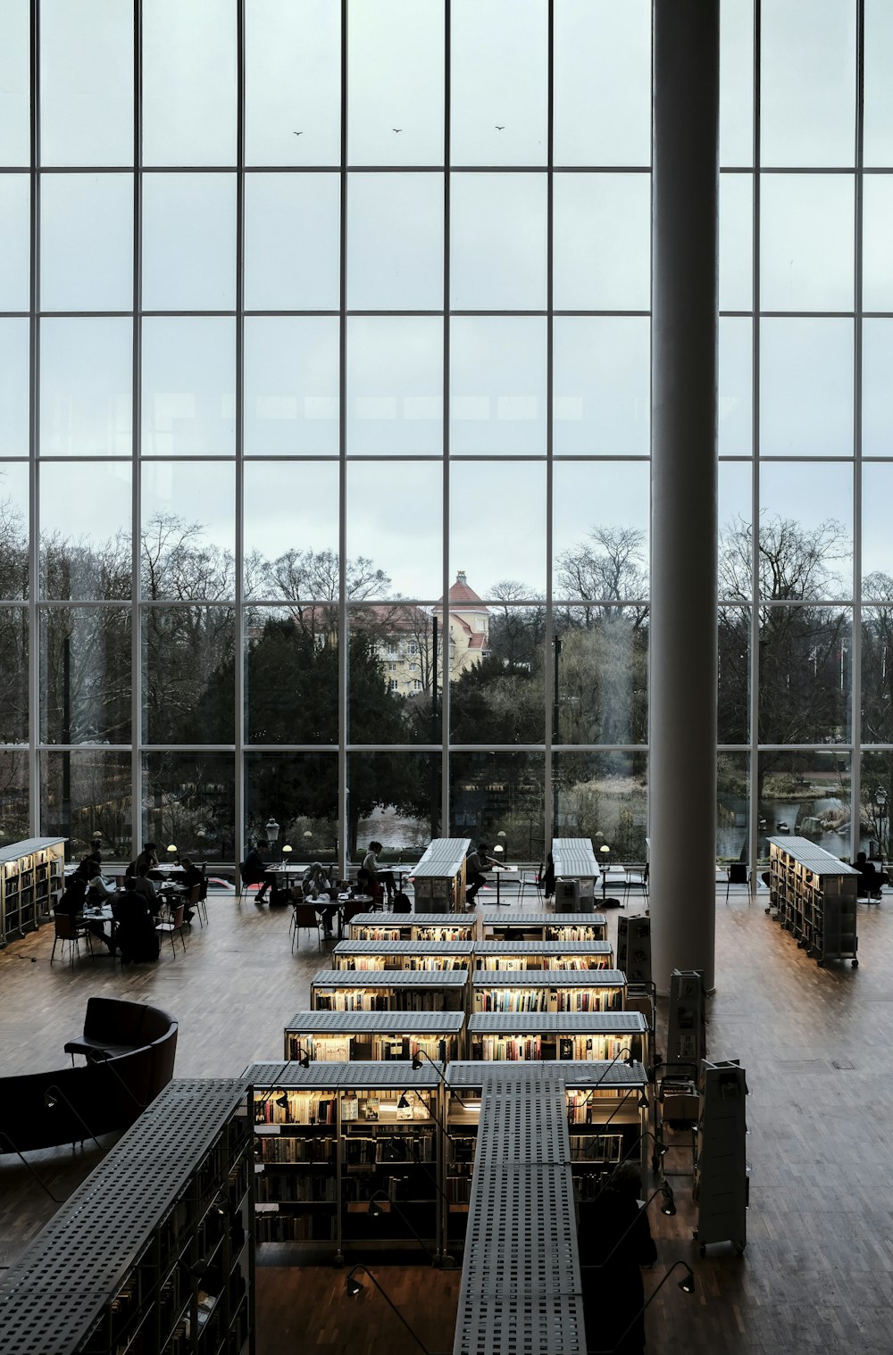 people inside glass building