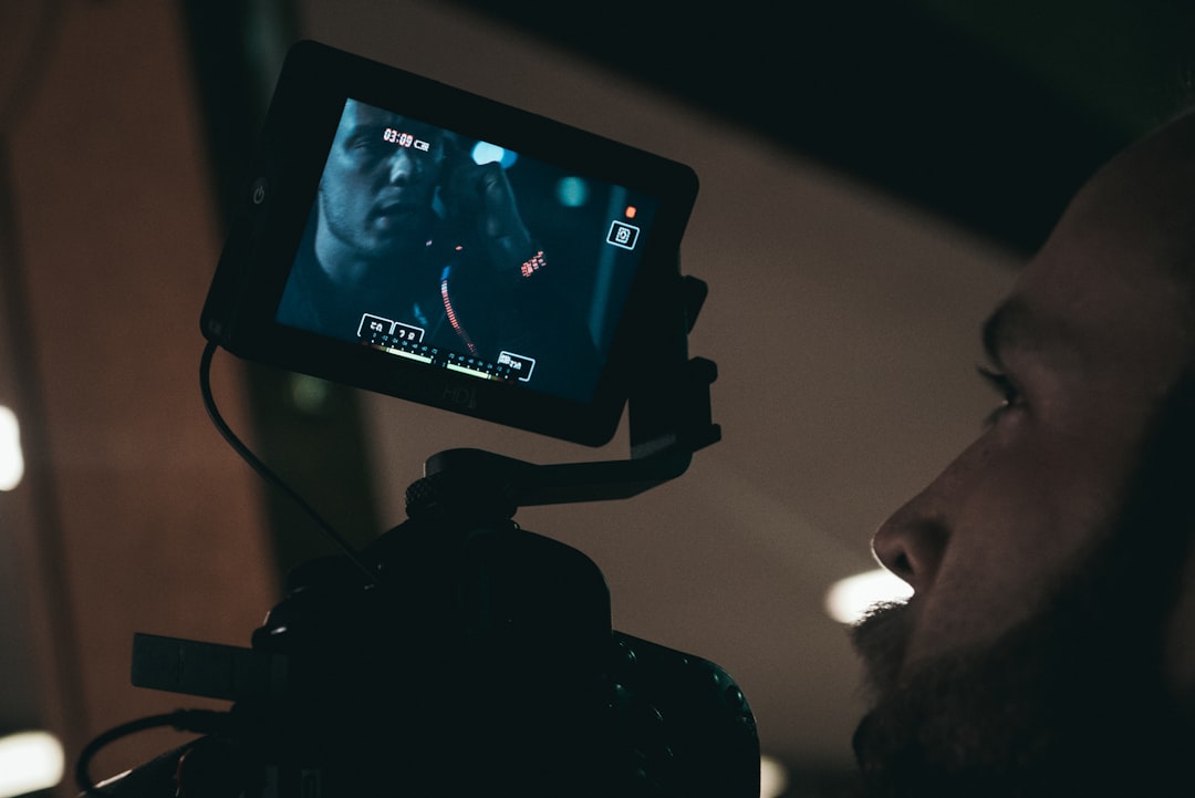 person holding camera,