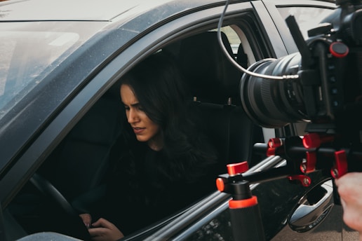 private acting classes picture of a woman in car