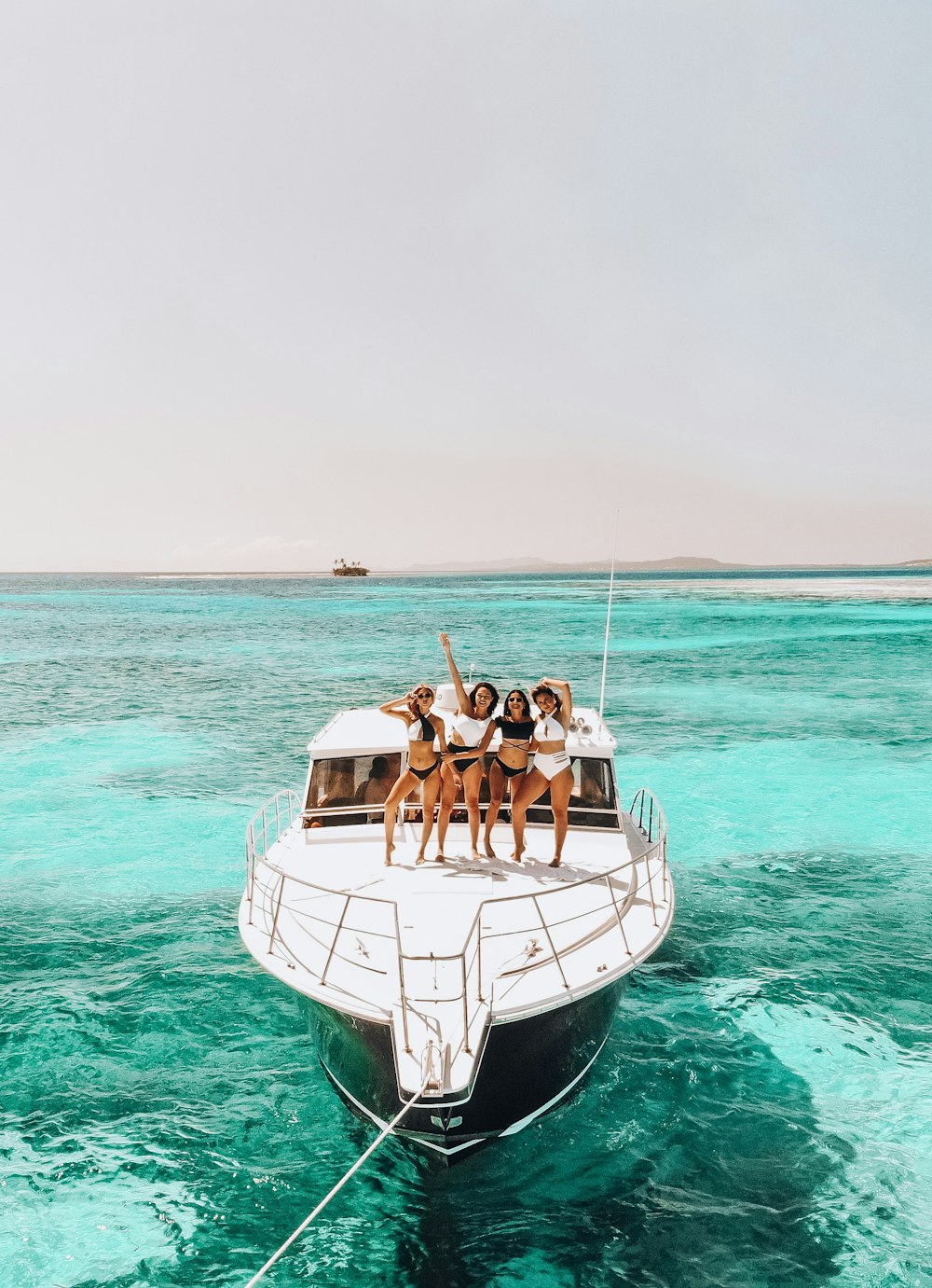 four girls in yacht