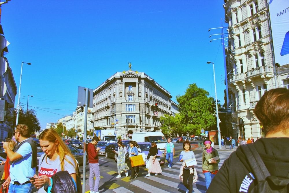 group of people walking near the building