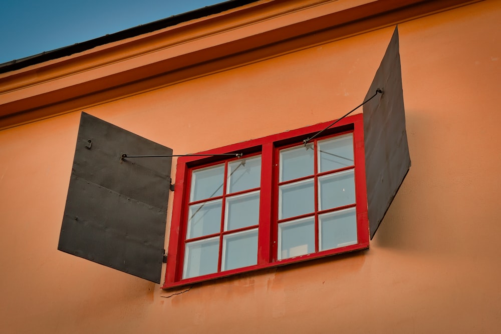 white wooden framed glass window opened