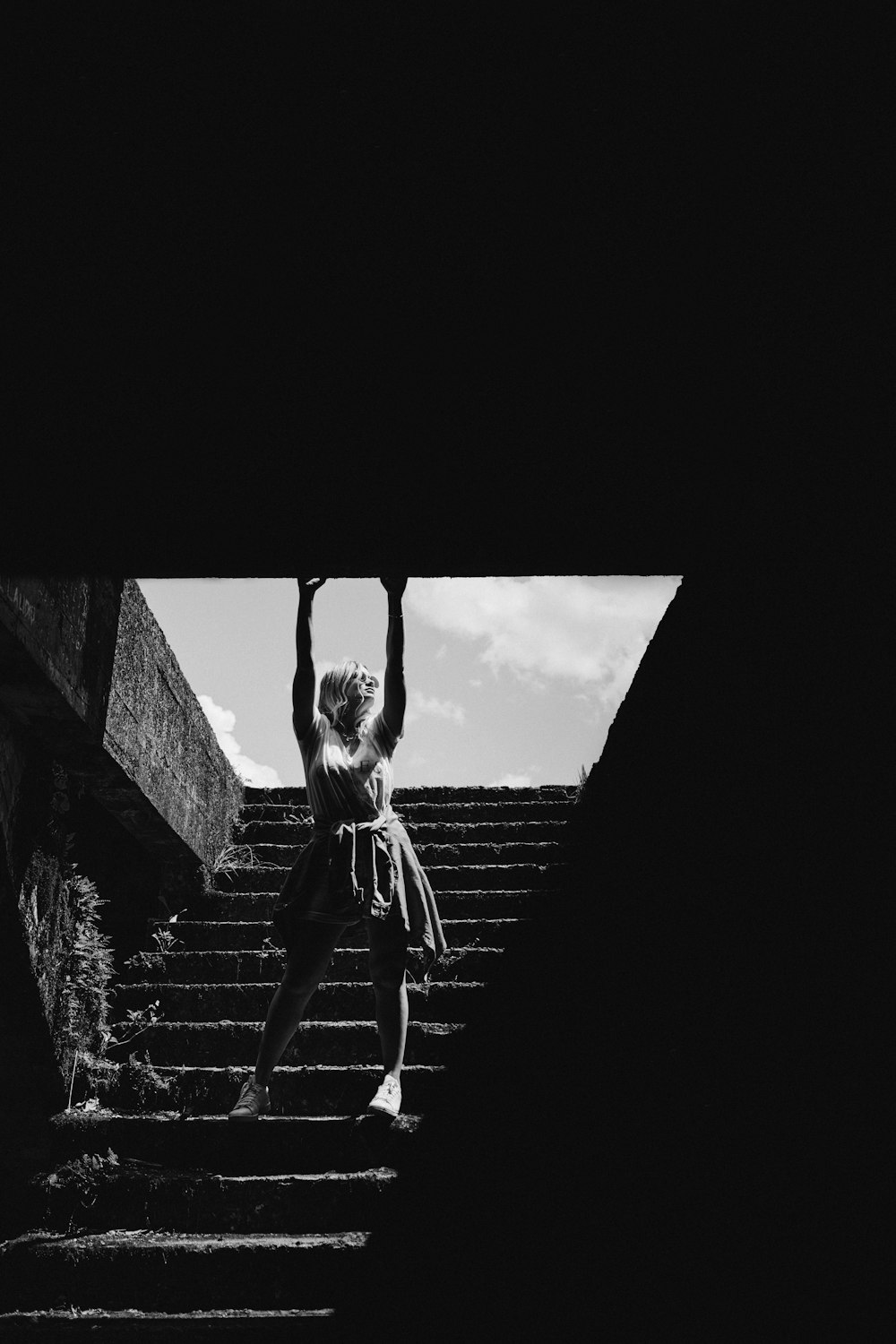 woman standing on staircase