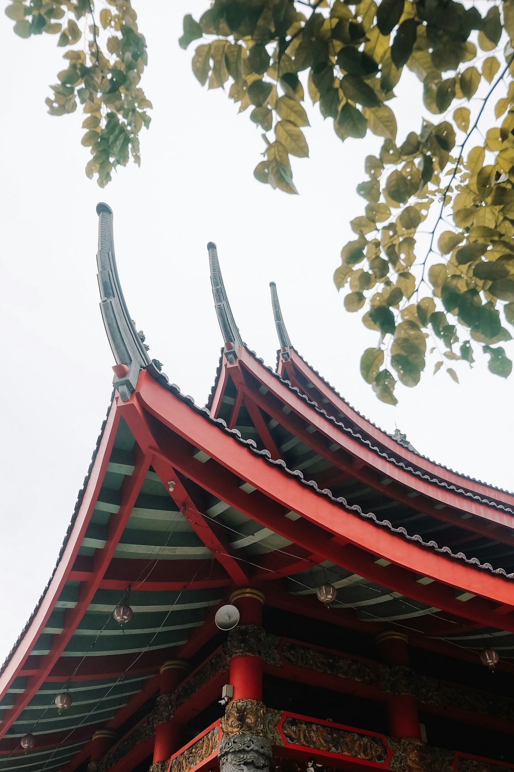 low angle photo of red temple