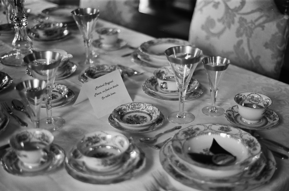 grayscale photography of table preparation