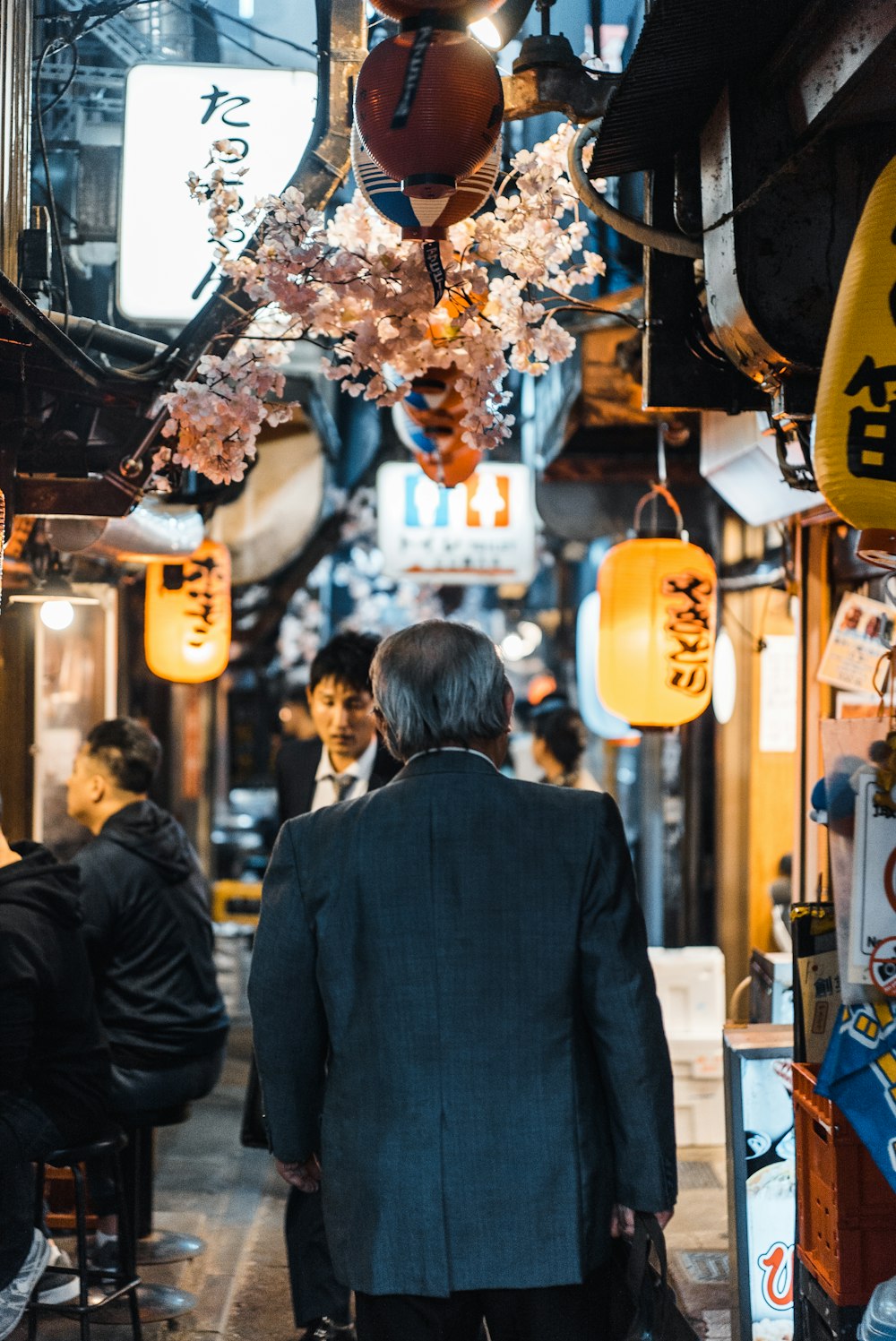 man walking beside street