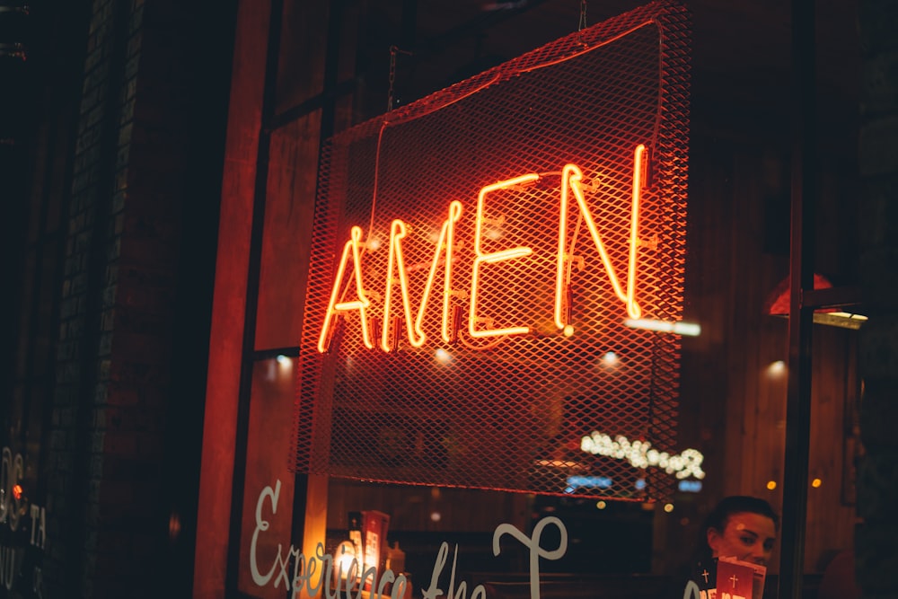 yellow AMEN neon sign