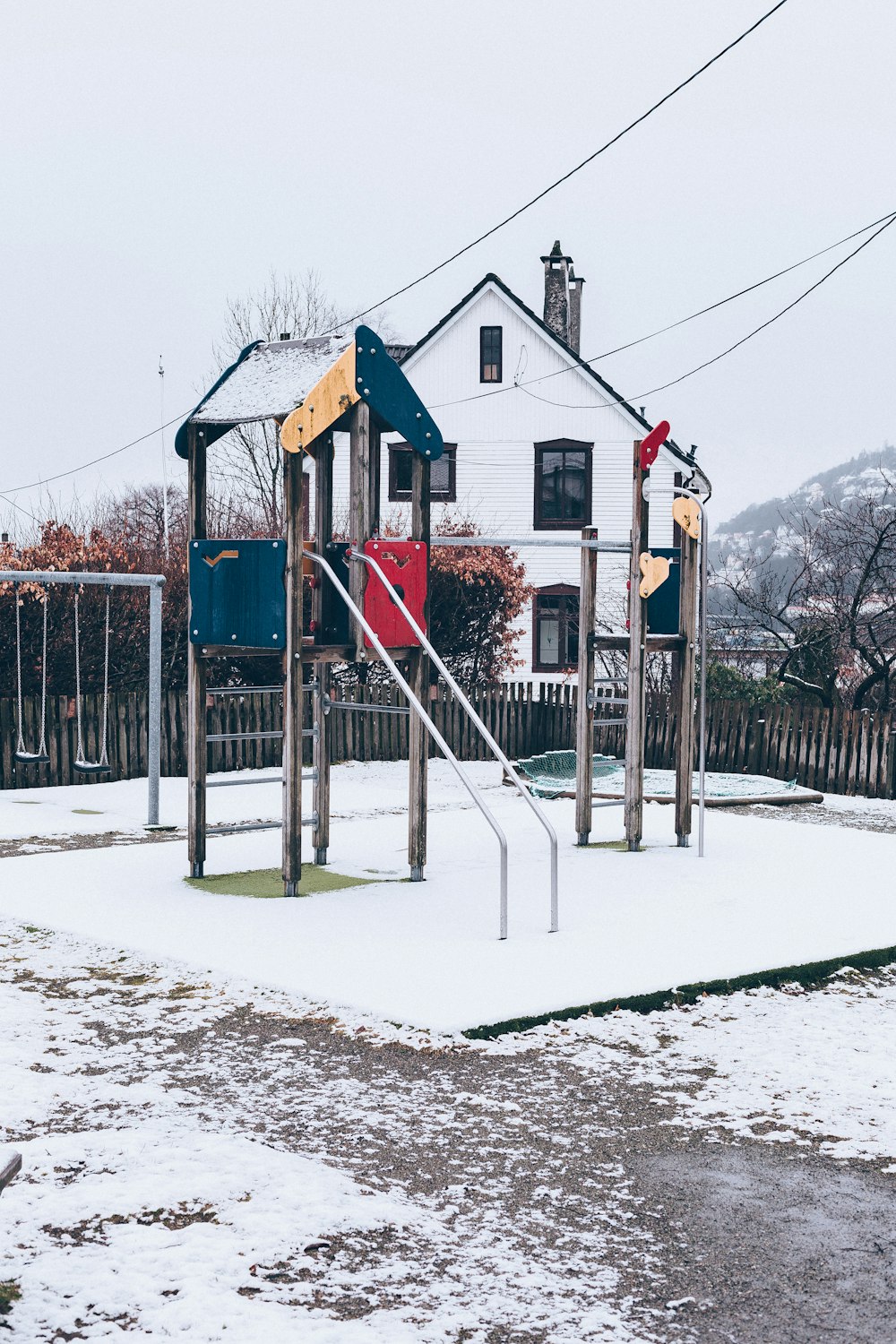 playground covered with snow