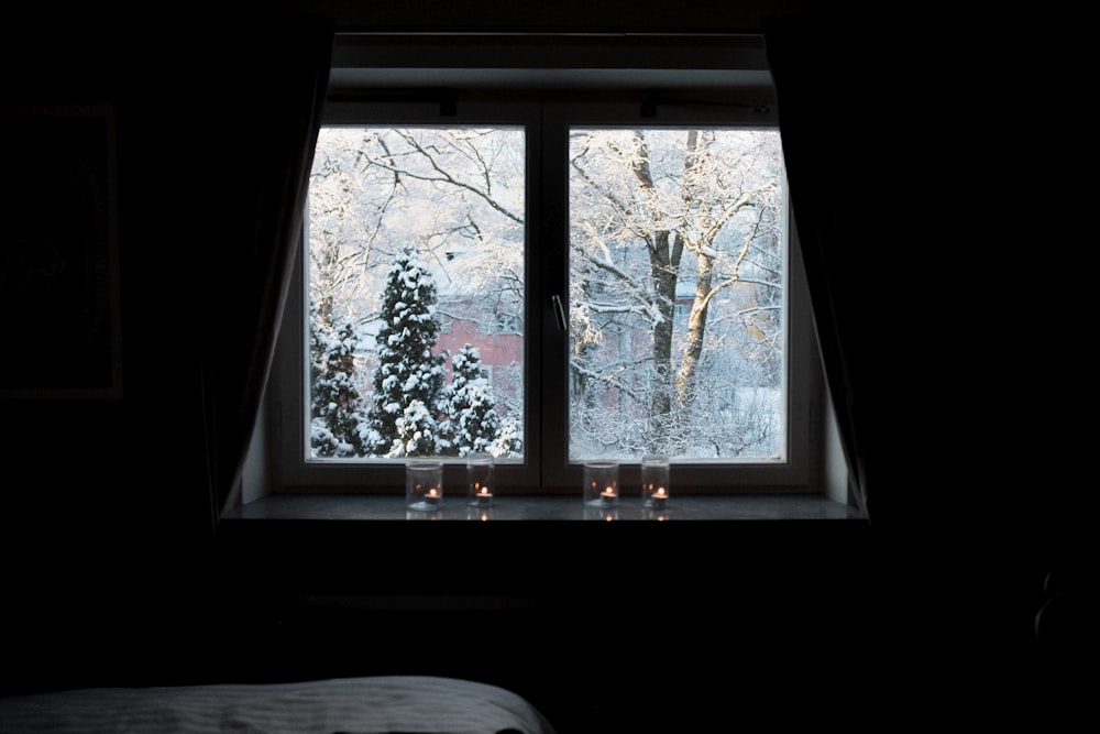 brown wooden framed glass window