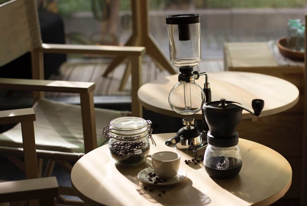 jar of coffee, mug, coffeemaker, and glass bong