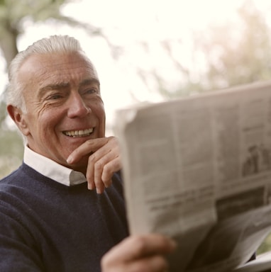 man reading newspaper