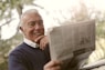 man reading newspaper