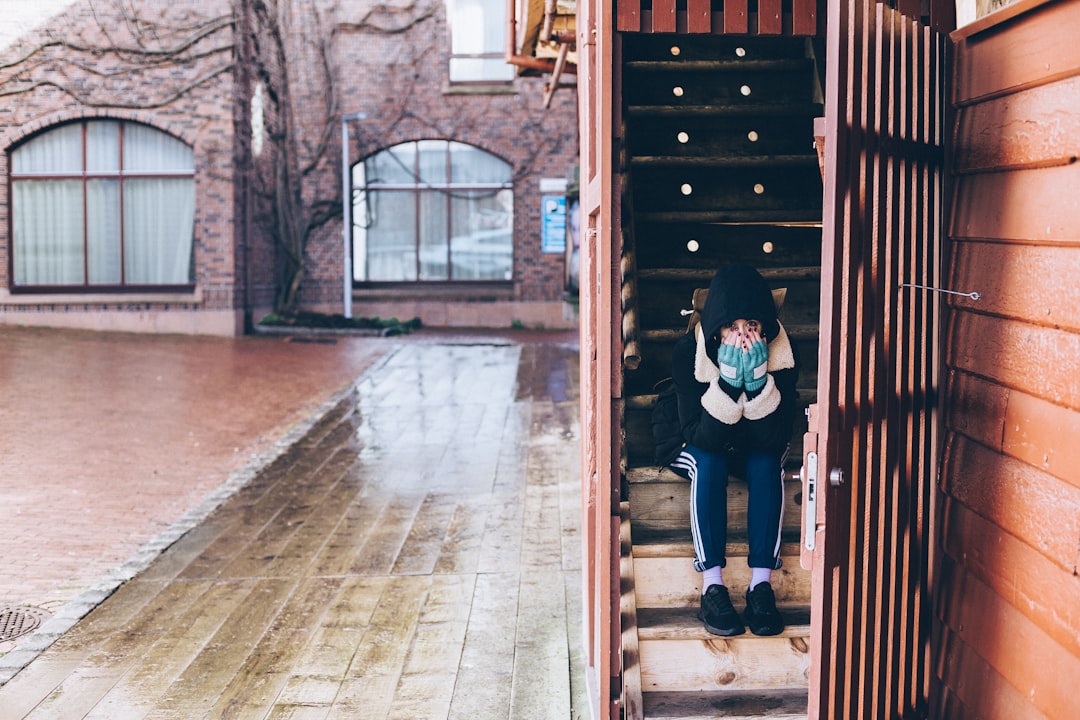 woman sitting on stairs