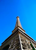 Panoramic image of completed steel structure skyline against a clear blue sky.
