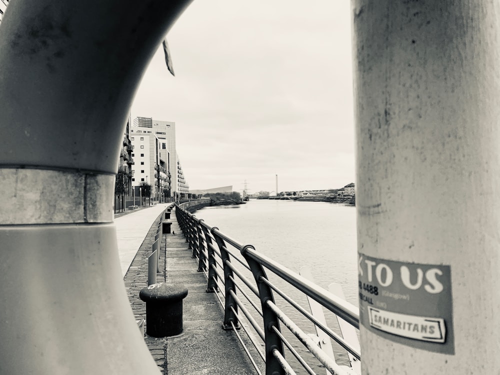grayscale photo of gray bridge
