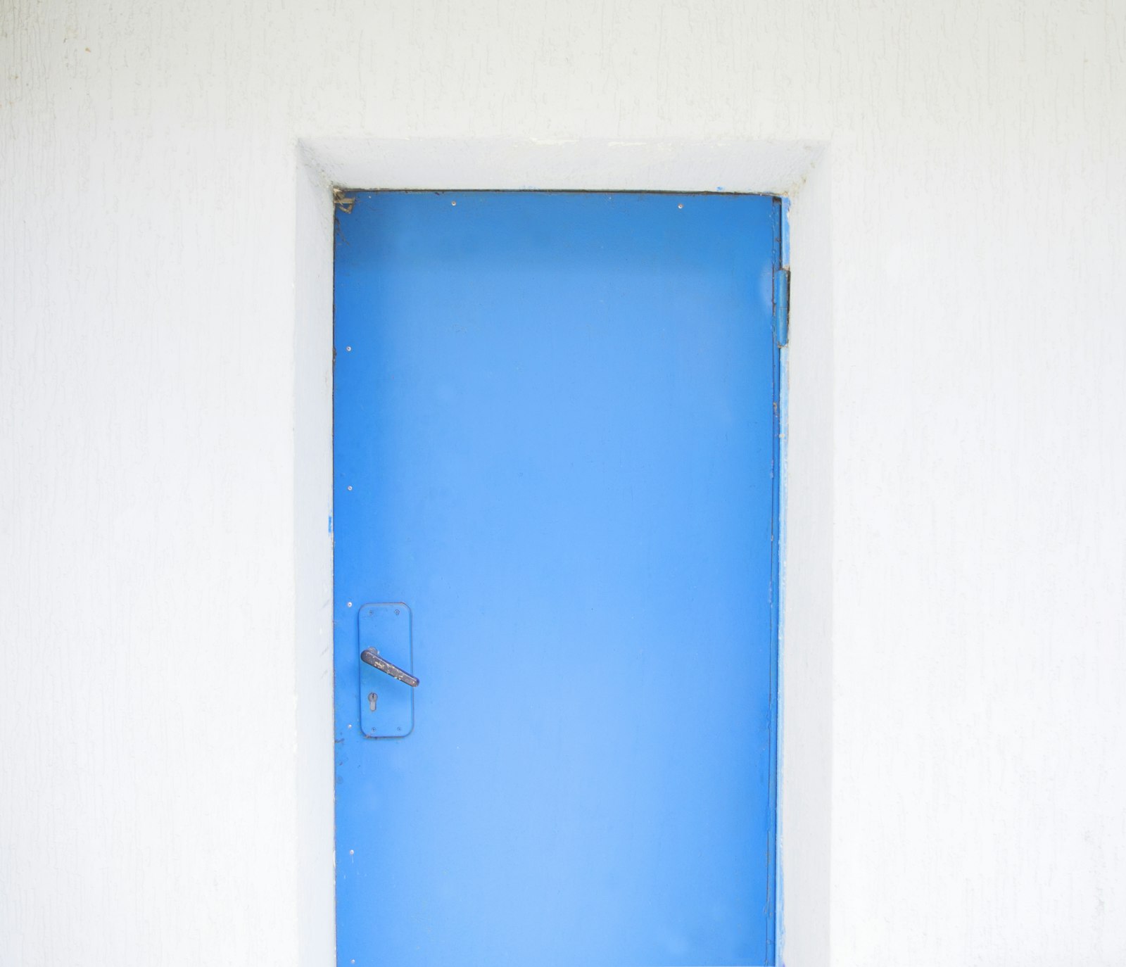 Pentax K-01 sample photo. Closed blue painted door photography