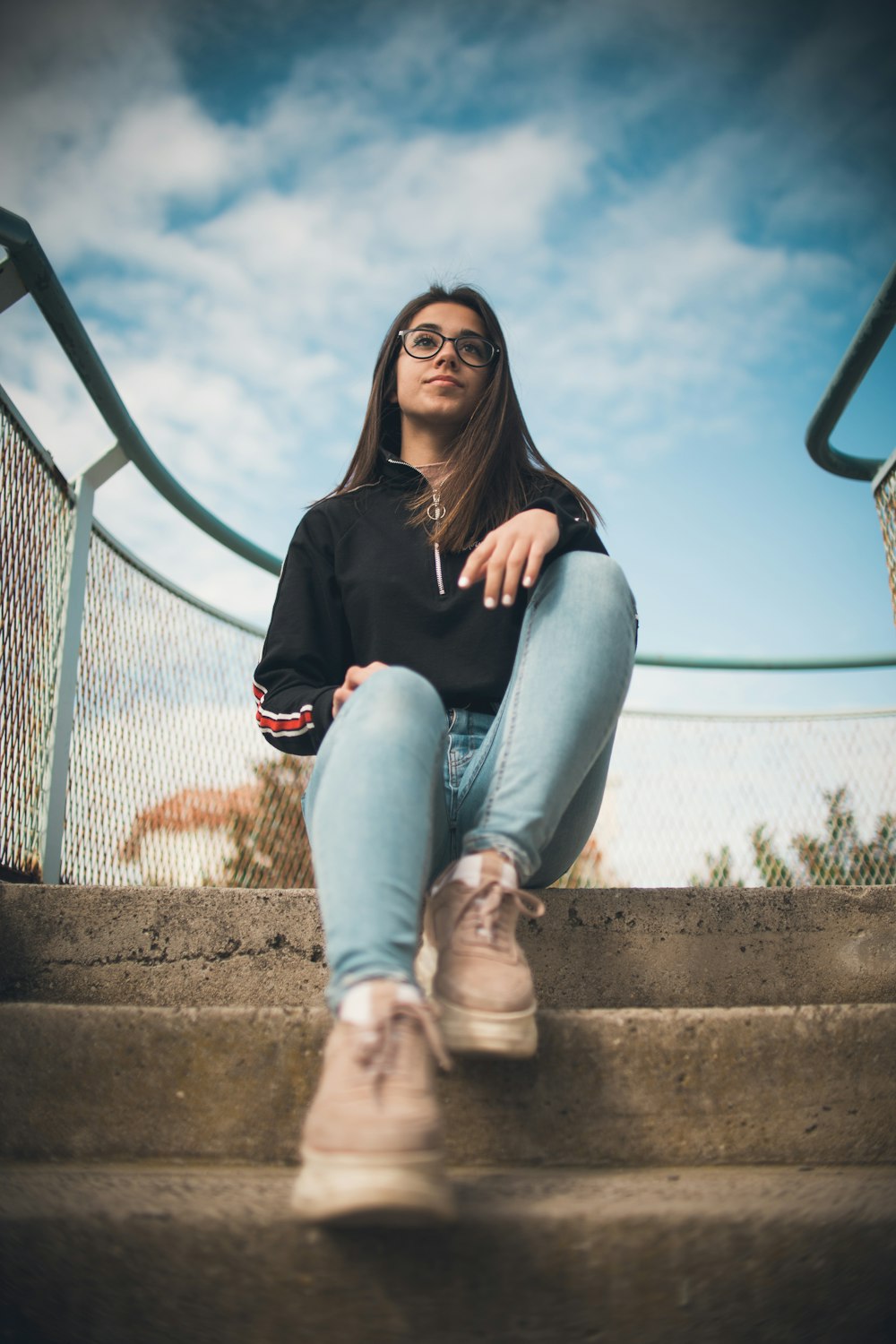 woman sitting on stairs