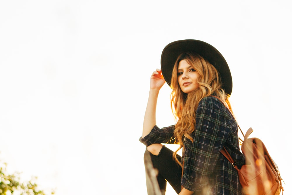 woman wearing black sunhat