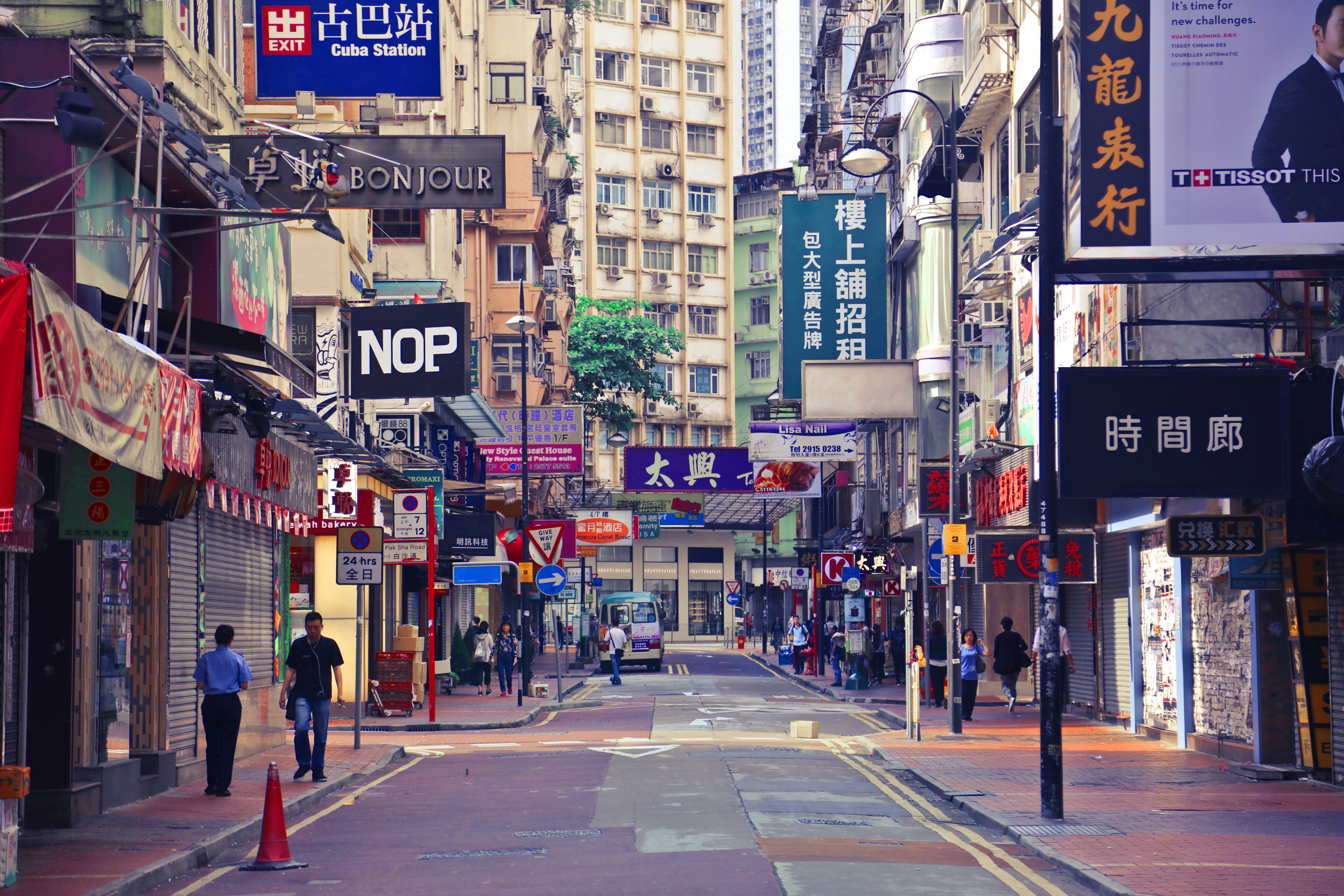 people walking beside store