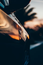 selective focus photography of black car