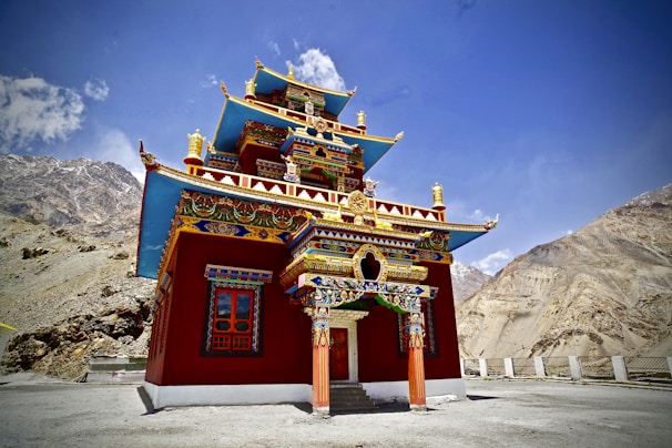 Close-up of intricate Tibetan Buddhist murals inside a monastery in Ladakh.