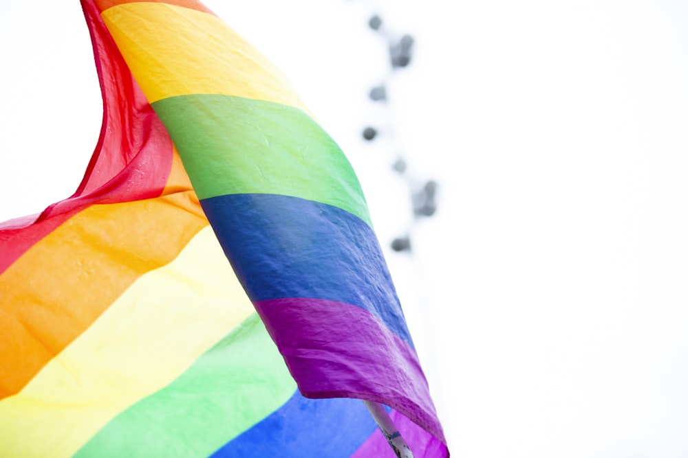 multicolored striped flag during daytime