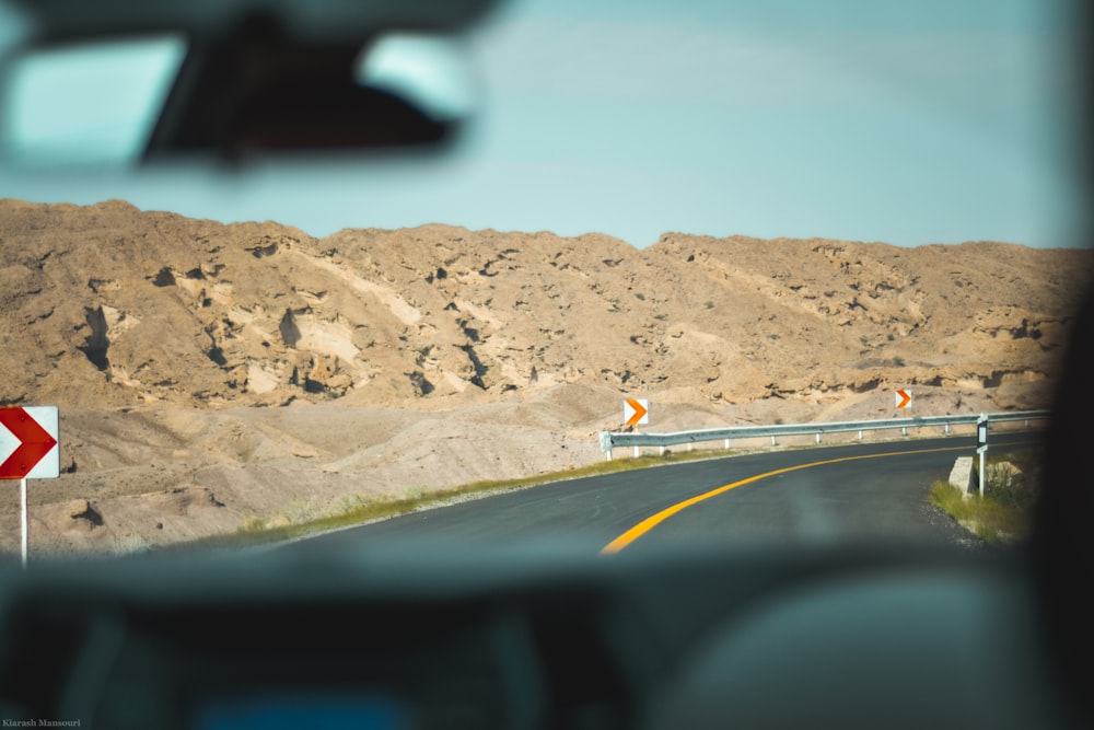 vehicle riding on asphalt road