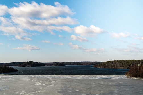 A serene Finnish landscape background for the contact section.