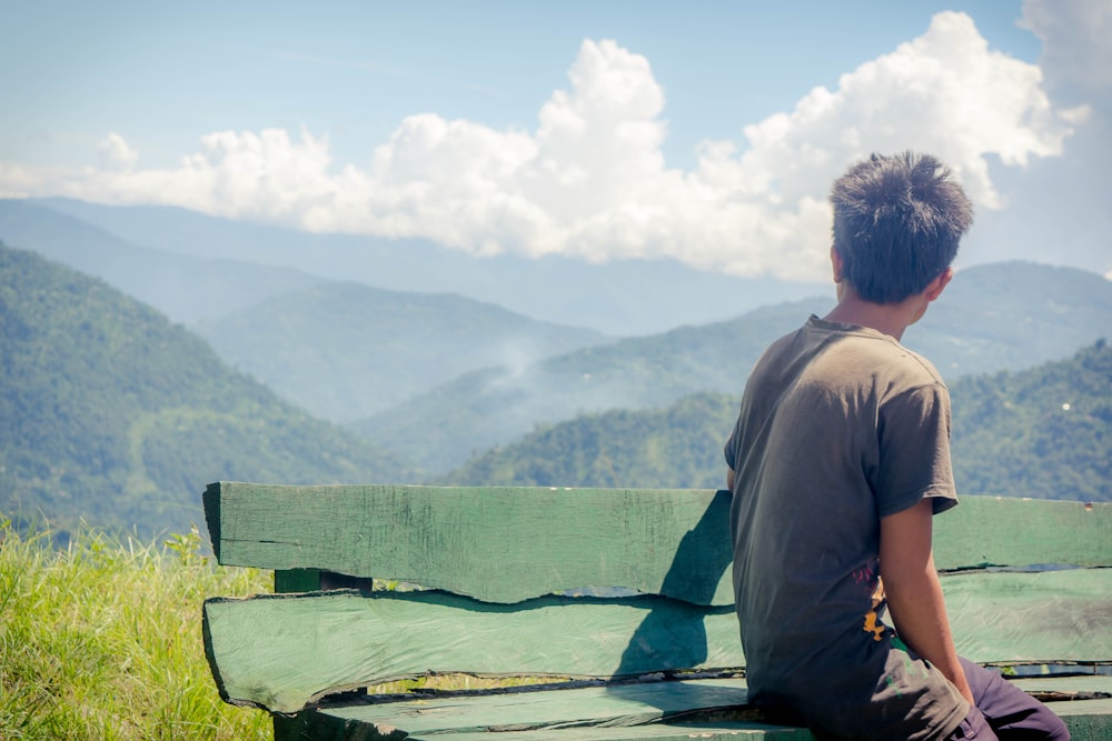 man sitting on bench