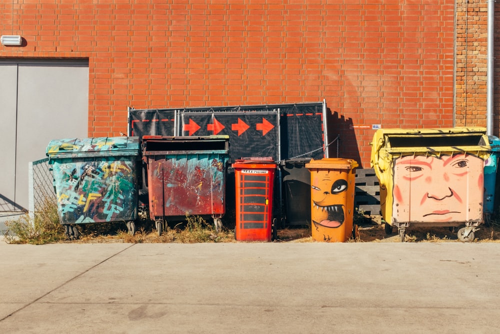assorted-color trash bins