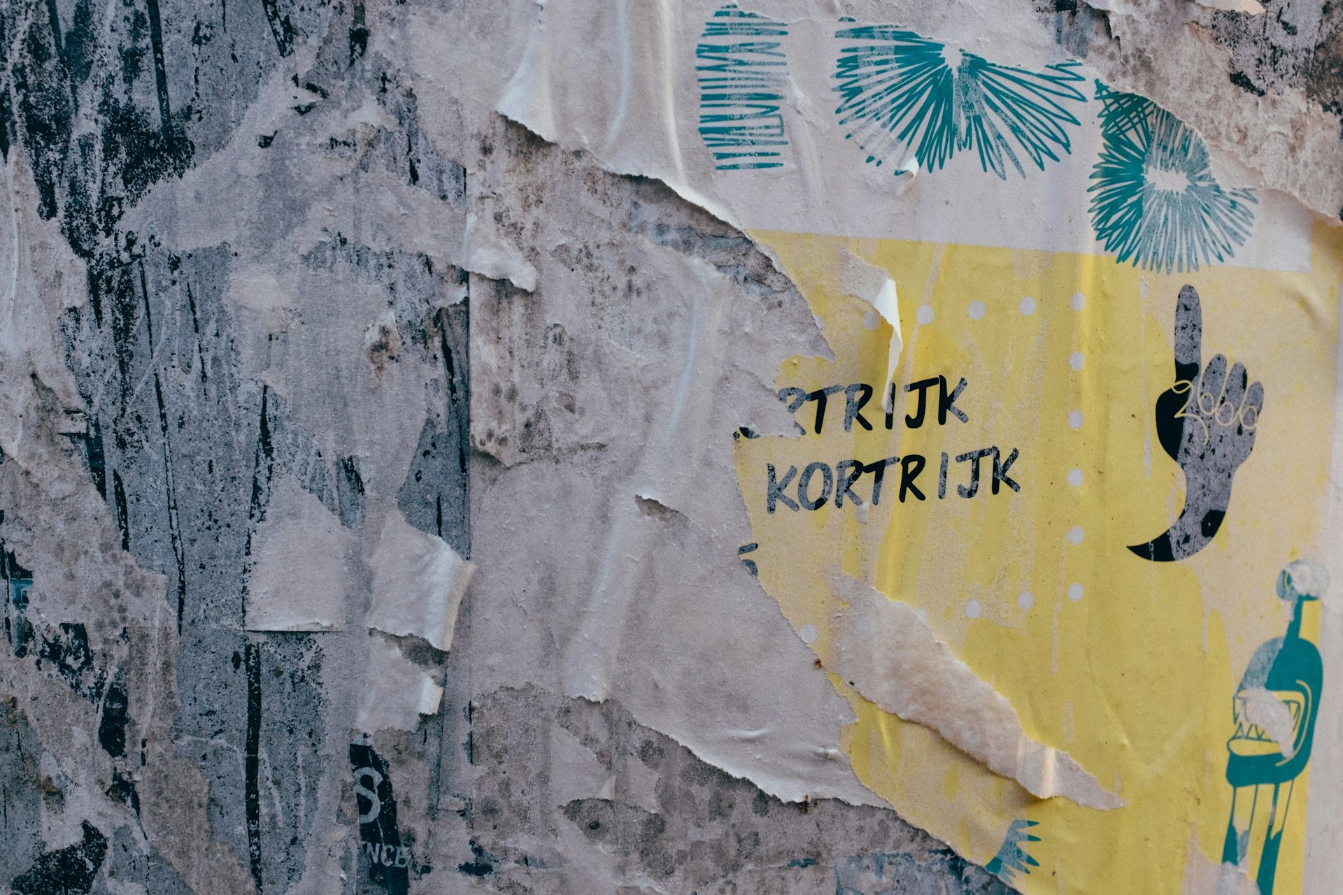 A close-up of a cracked vintage horror movie poster with blood-red lettering and grainy textures.